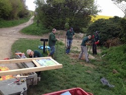 Installing an information board on The Ridgeway near The White Horse